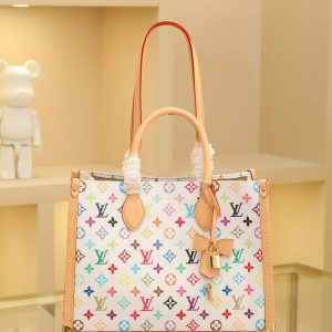 Louis Vuitton x Takashi Murakami Re-Edition Collection reimagines the OnTheGo Medium bag with dynamic brushstrokes. The vibrant Monogram canvas body, calf leather trim, and LV x TM key case showcase refined elegance, while polished corner pieces evoke Louis Vuitton's heritage trunk design. The shoulder strap and top handle offer versatile carrying options.27 x 14 x 35 cm (Height x Width x Length)